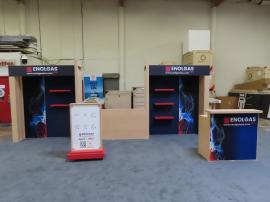 Modified VK-4044 Reconfigurable Inline Exhibit with Shelves, Monitor Mount, Backlit Fabric Graphics, Canopy, Modified MOD-1726 Counter with Locking Storage, and Product Display. Shown w/o LED Video Tiles (Center Section) -- View 2